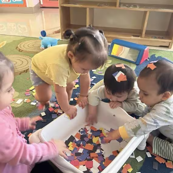 Kids learning and playing at our childcare center